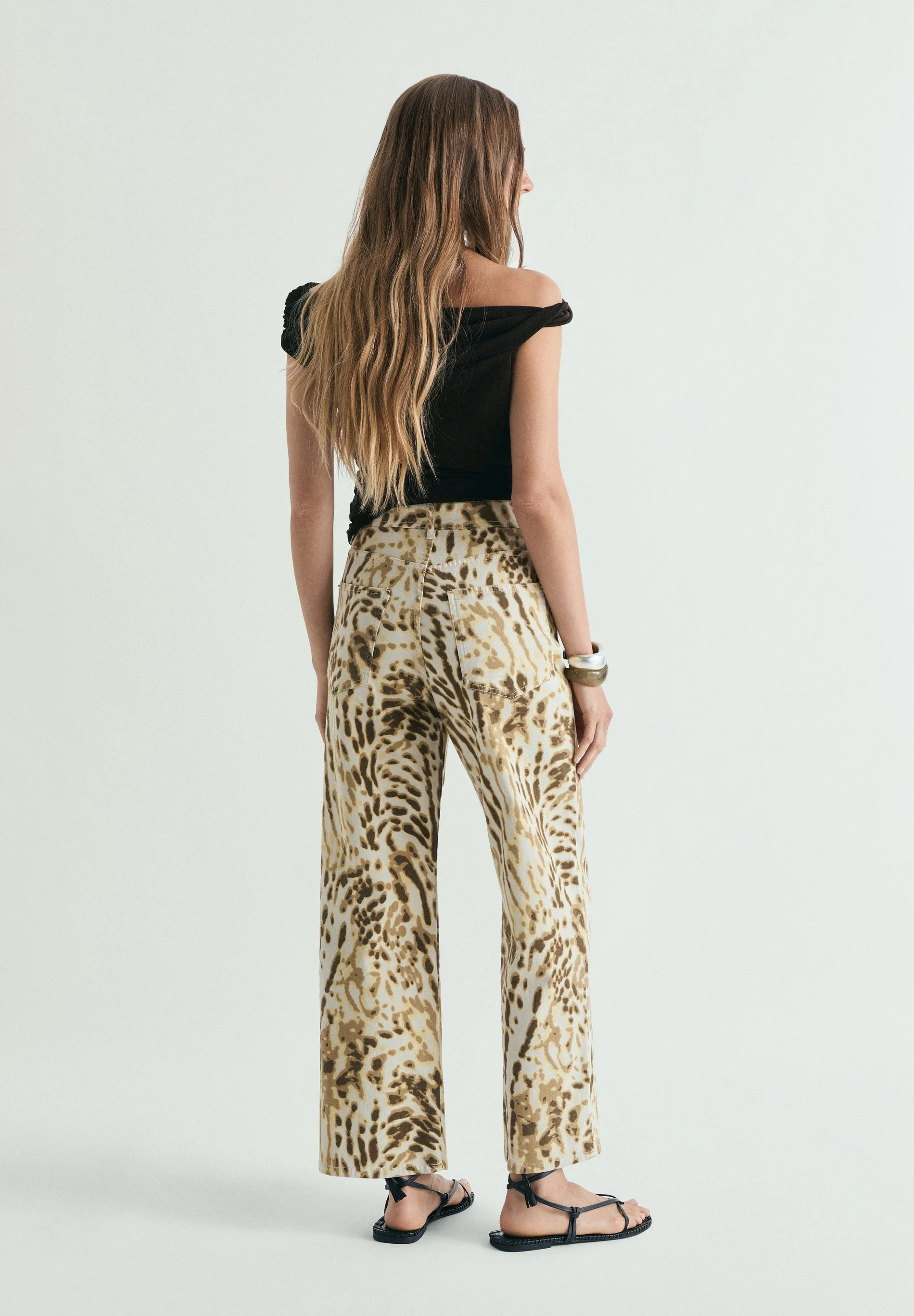 CALÇAS DENIM COM ESTAMPADO ANIMAL - Image 3
